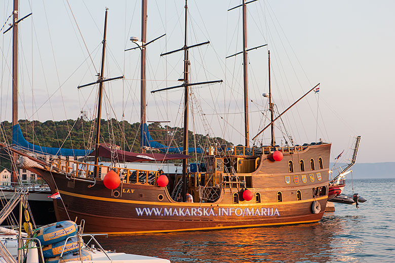 masts and sails on boat in Makarska